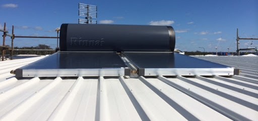 Solar hot water system fitted on a corrugated metal roof in North Lakes